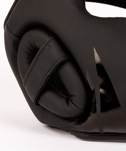 Venum nyrkkeilykypärä lapsille musta nyrkkeily lasten kamppailuvarusteet kypärä kids boxing helmet head gear kypärä lapselle, yksityiskohta sivusta
