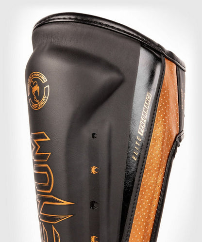 VENUM ELITE Evo Säärisuojat - Musta-Kulta